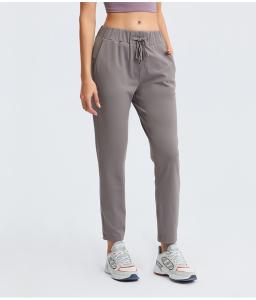 China New Nude Loose Yoga Pants Elastic Draw Rope Straight Leg Casual Fitness Pants for Women factory