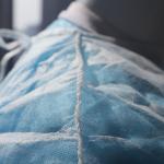 High quality Non-woven disposable cape disposable protective cloth cape