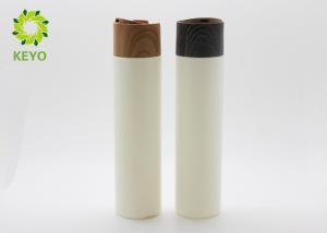 China 8 OZ Cylindrical Shampoo And Conditioner Bottles With Wooden Color Press Cap factory