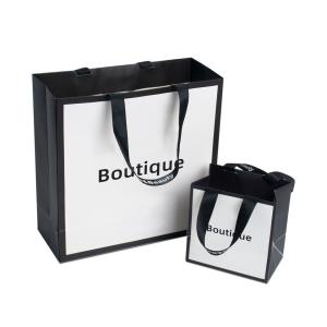 China Luxury Customized Printed Euro Paper Gift Bags With Logo Gravure Printing Ivory Board factory