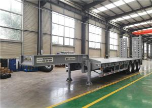 China 3 Axles 60 Ton Low Bed Semi Trailer With Detachable And Folding Ladders factory
