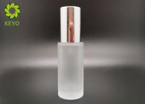 China Clear 30ml Frosted Glass Bottle Foundation Cosmetics Packing With Silver Collar Pump factory