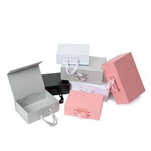 China CMYK Printing Collapsible Paperboard Magnetic Gift Box With Silk Ribbon factory