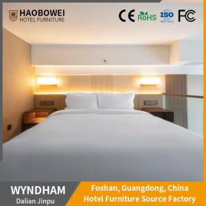 China Applicable Scenarios Indoor Five Star Hotel Luxury Business Bedroom Set Headboard Bed factory