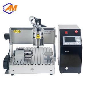 China Price of hot sell mini metal cnc 3d professional cnc router machinery 3040 4 axis cnc design engraving machine factory
