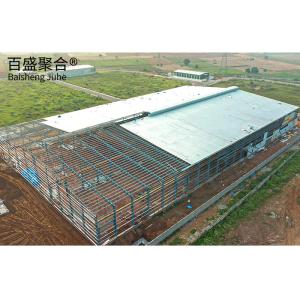 China Painted Prefabricated Steel Frame Structural Warehouse Metal Building with Sliding Door factory