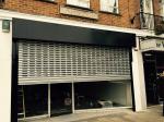 Motorized With Remote Control Punched Steel Roller Shutter Door / Steel Roller