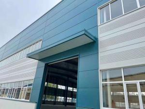 China Prefabricated Steel Frame Workshop Kit Galvanized Prefab Metal Garage Buildings factory