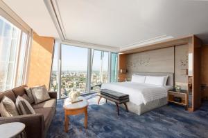 China Star Hotel Room Furniture Upholstered bed with Sofa chairs and Fixed wood Panels in Wall Wardrobe cabinets factory
