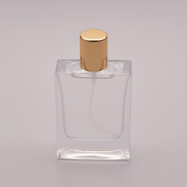 China 50ml Flat Glass Perfume Bottle With Small Gold Cap factory