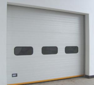 China Fast Lifting Sectional Industrial Door 380V Motor 26DB Sound Insulation factory
