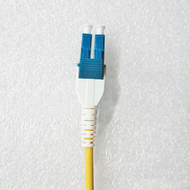 OS2 PVC/OFNR/LSZH Fiber Patch Cord LC To LC Uniboot Reverse Polarity Duplex BIF G657a1