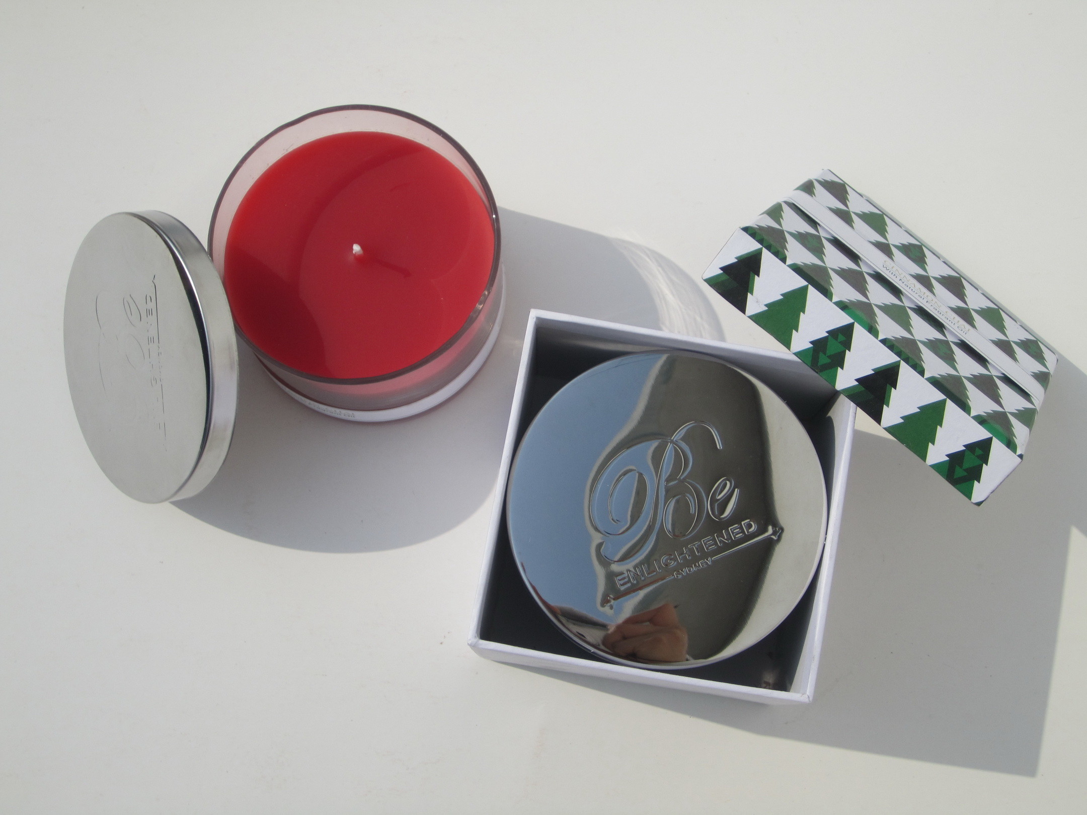 Red & Green Round scented glass candle with printed metal lid and printed label and packed into gift box
