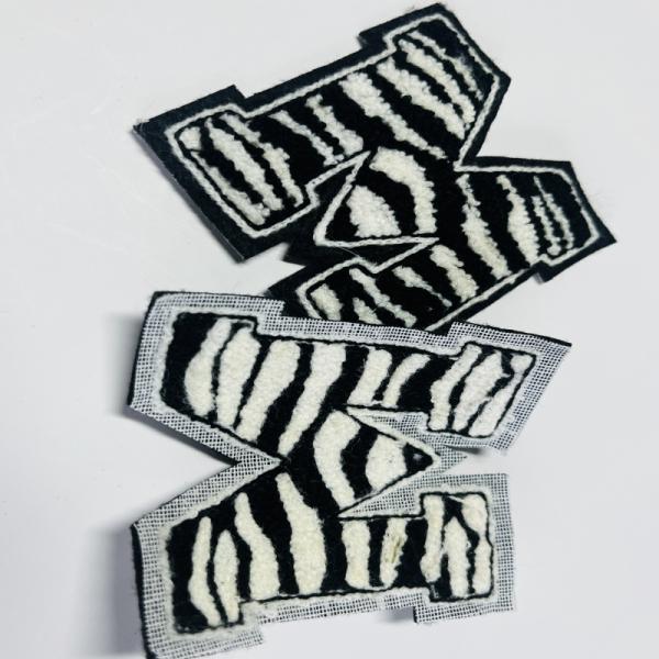 China Standard Or Custom Hole Size Garment Patches With Full Color Printing For Customized Designs And Personalized Styles factory