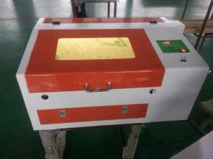 China mini laser engraving 40W 50W machine laser CO2 glass engraving desktop CNC 3040 laser machine Price factory