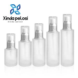 China Clear Frosted Lotion Container Plastic Refillable Travel Lotion Bottle Pump Gold Cap Customized Packaging factory