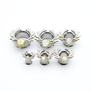 China Ear Plug Tunnels In Stainless Steel Ear Plug Tunnel With White Shell Paper factory