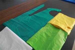 China Green / Blue / Yellow Disposable Plastic Aprons Embossed Surface Anti Bacterial factory