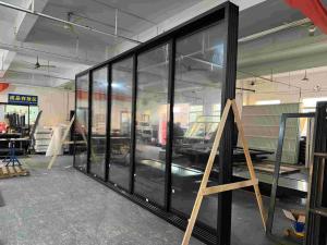 China Custom and Easy Installment 5 traqcks Alumimum Sliding Glass Door good sealing windowproof factory