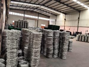 China Low Carbon Steel 12 Gauge Barbed Wire Security Fence / Coiled Barbed Wire factory