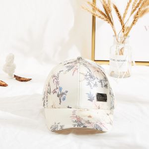 Six Panels Metal Patch Curve Brim Baseball Cap Floral Pattern