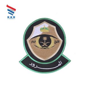 China Custom iron on twill heat cut eye embroidery patch for garment accessory factory