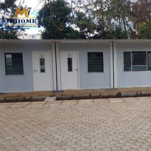 China Prefabricated Portable Container House Flat Pack Steel Frame Sandwich Panel Container House factory