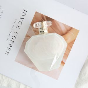 China Customized Luxury Fashion Milky White Perfume Bottle Cap Logo Customization on sale