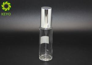 China 30ml Round Empty Glass Foundation Bottle Clear Material Made With Silver Pump factory