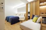 Perth hotel interior design FFE solution by laminate wood headboard bed with