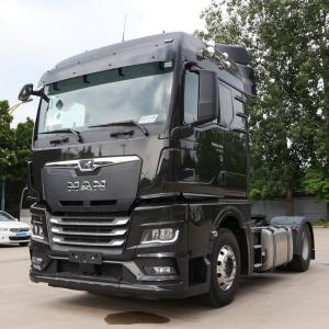 China Man Tractor Truck Load Capacity Diesel Power New Or Used Trailer Head Stable Powerful factory