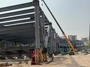 China Sandwich Panel Prefabricated Steel Structures Efficient Building Construction For Commercial Properties factory