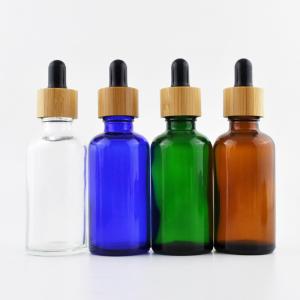 China OEM ODM 30ml Amber Essential Oil Dropper Bottles With Bamboo Lid factory