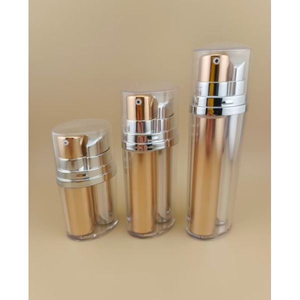 China Two-Color Golden and Silvery Airless Pump Bottle with Outer Covering for Cosmetic and Skincare Product factory
