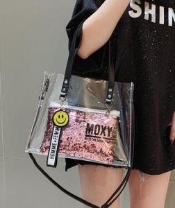 China Customized Clear Waterproof Toiletry Bag ,ShinningPVC Transparent Bag, Long Hand ladies bag factory