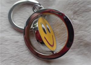 China Color Silver Key Chain Personalized Promotional Gifts With Rotatable Smiling Yellow Face factory