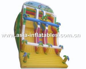 China Inflatable Dual Lane Slide With Palm Tree For Sand Beach Games factory