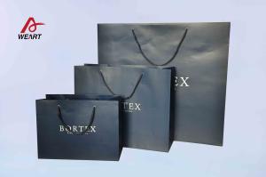 China Embossed Logo Art Paper Bags Different Design Style For Gift Daily Commodities factory