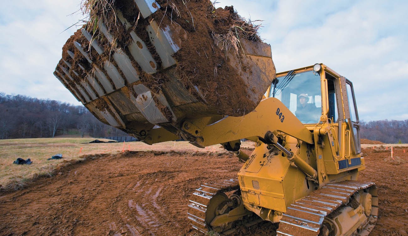 Excavator self - lubricating bearing applications