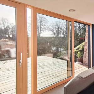China Customizable Sleek Aluminum Lift And Sliding Waterproof Doors For Homes And Offices factory