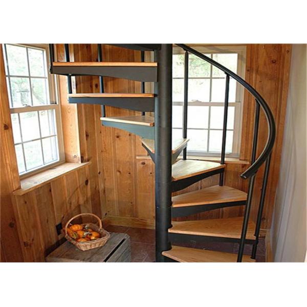 China Walnut Tread Custom Spiral Staircase With Round Post Glass Balustrade factory