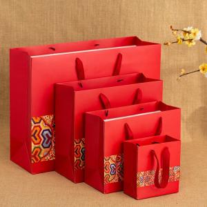China Custom Design Logo Red Exquisite Special Paper Packaging Bag Shopping Gift Bags With Handle factory