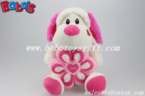 China Lovely Cute Sitting Plush Dog Toy With Pink Flower Pillow factory