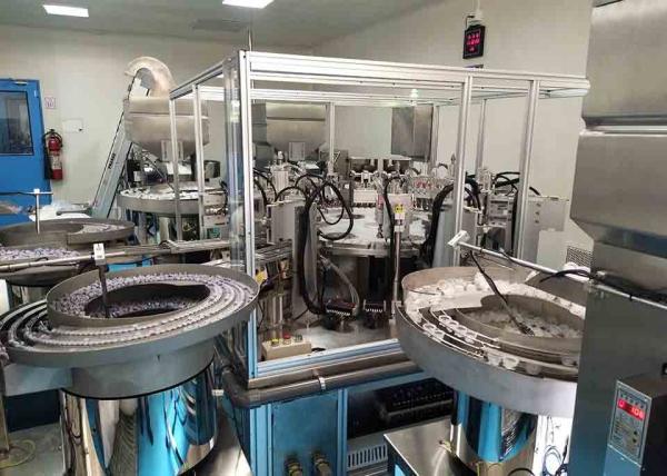 China Eight station double folding cap assembly machine factory