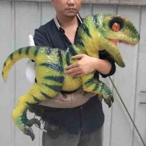 China Cutest popular customizable large simulation waterproof Animatronic Dinosaur baby toy in hands for Theme Park factory