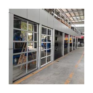 China Aluminum Transparent Glass Automatically Garage Door For Residential Buildings factory