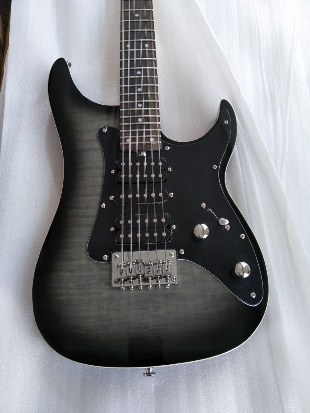 New arrival 6 string electric guitar with silvery bridge and cool shape