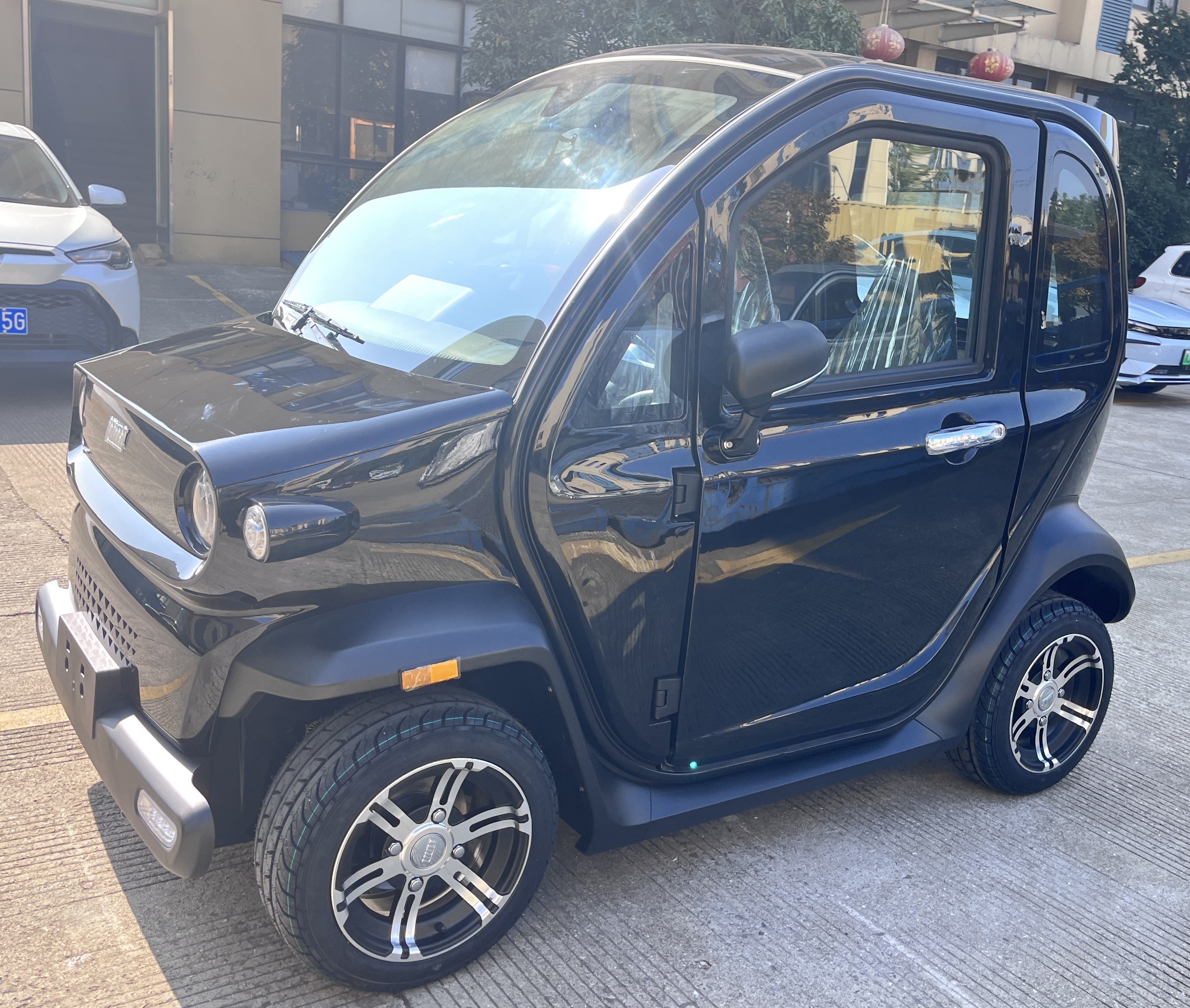 Mini 4 Wheel Cheap Price China 4 Seats Electric car With Air Condition Mini New energy car with EEC