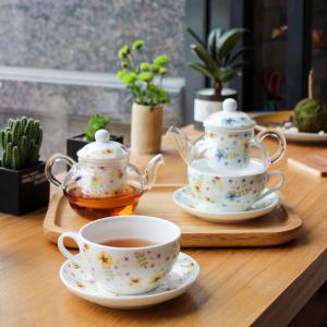 China One Person Afternoon Tea Ceramic Cup and Saucer with Sustainable Tea Infuser Strainer factory