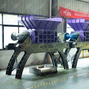 China Xrido Double Shaft Waste Plastic Shredder 300-22000 Kg/hour Capacity on sale
